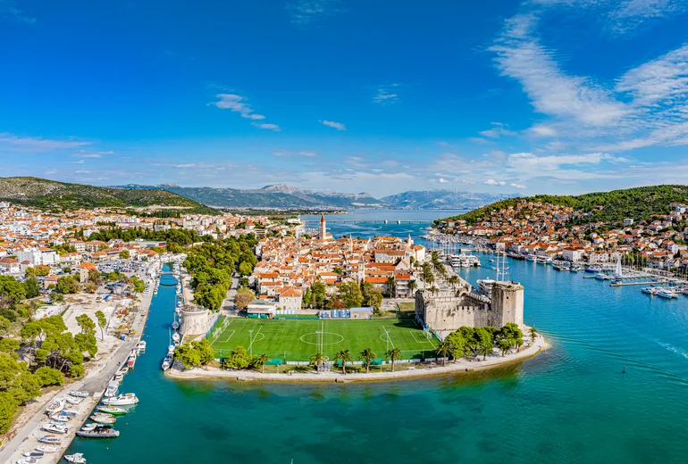 Aerial panorama of Trogir old town, Kamerlengo fortress and marinas